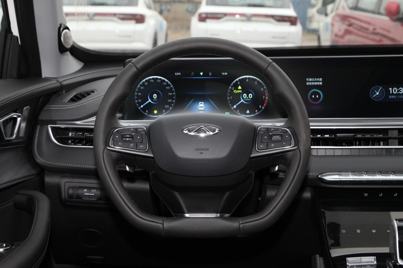 瑞虎8 plusmhev 230tci cvt两驱豪情版方向盘